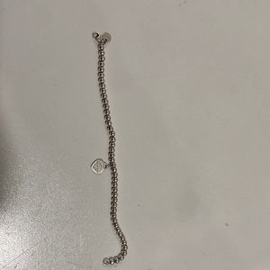 Return to Tiffany®
Heart Tag Bead Bracelet
in Silver
